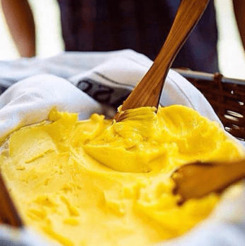 bright yellow unpaddled butter in a bowl
